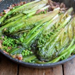Braised Ruby Baby Gem Lettuce with Spring Onions, Peas, Bacon and Crème Fraîche