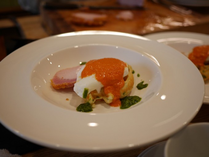 Olson’s Eggs Benedict Poached Eggs on Scallion Waffles with Roasted Peameal Bacon And Tomato “Hollandaise”